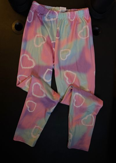 Multi colored heart patterned leggings Size 9
