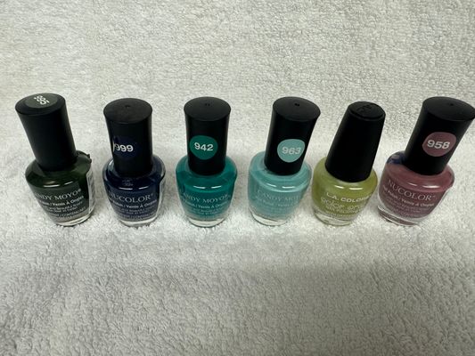 Brand New Nail polishes. Set of 7. Some have spill Some have spills on it from another bottle. All brand New