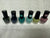 Brand New Nail polishes. Set of 7. Some have spill Some have spills on it from another bottle. All brand New