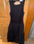 Row A Black mixed fabric open back dress - worn once Women's - S
