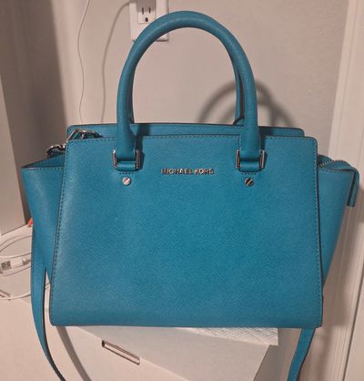 Michael Kors MK small turquoise handbag Near perfect condition, comes with protective storage bag