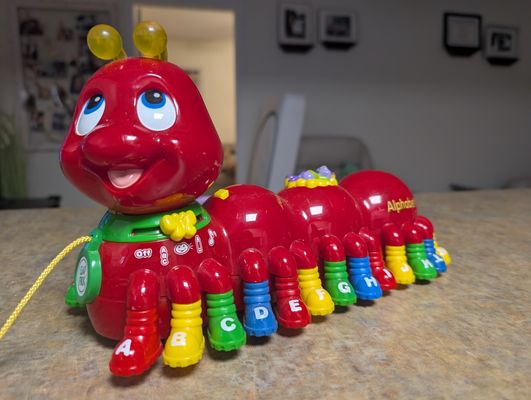 Leapfrog Alphabet pal 26-legged caterpillar pull toy with music and games