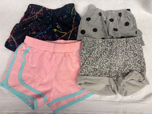 Disney Junior, Cisco, Champion, Dori Creations. 4 pairs of girls shorts. Size 2T 2T
