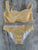 Stripped bikini top is 34DD bottom is M  Women's Med (10-12)