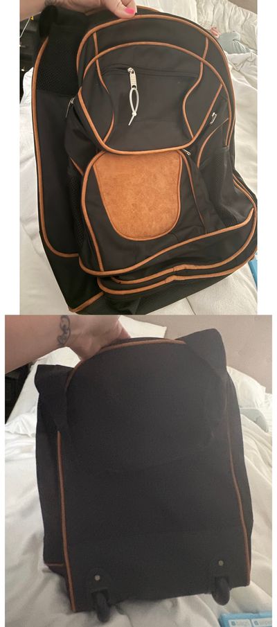 Unknown Carry on size rolling suitcase duffel bag