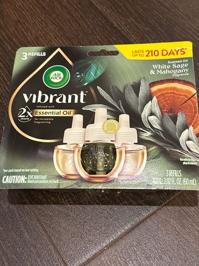 Brand new Airwick vibrant three refill air freshen Retail 12$  Essential oil, white sage, and mahogany fragrance
