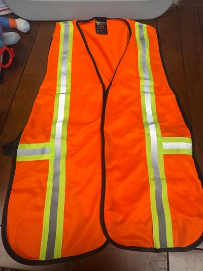 Construction vest. On the bigger side. No size Construction vest. On the bigger side. No size 6T/6