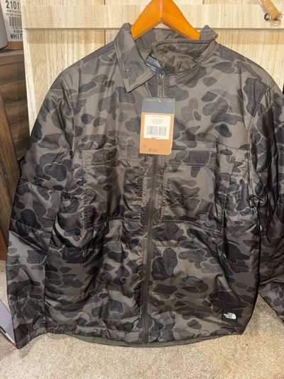 North Face Brand New The North Face Reversible boys Camo jacket. Size XL 18 14-16