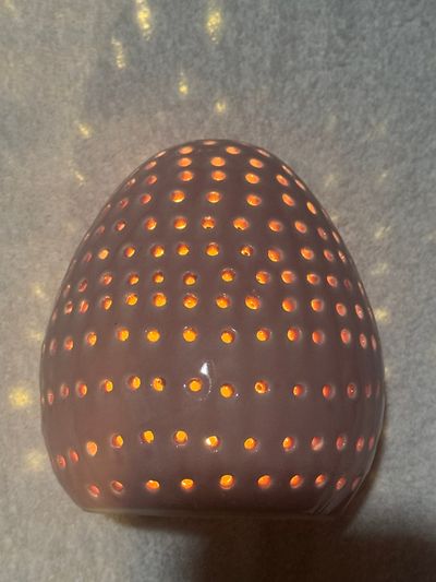Ceramic Easter Egg. Lights up and makes the wall Ceramic Easter Egg. Lights up and makes the wall Pretty