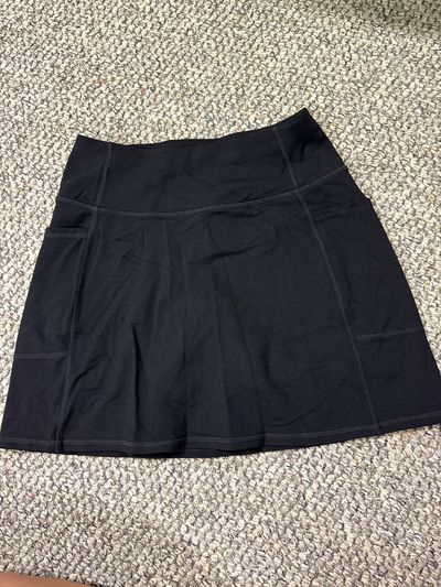 Skechers Black skirt with shirts underneath 10-12