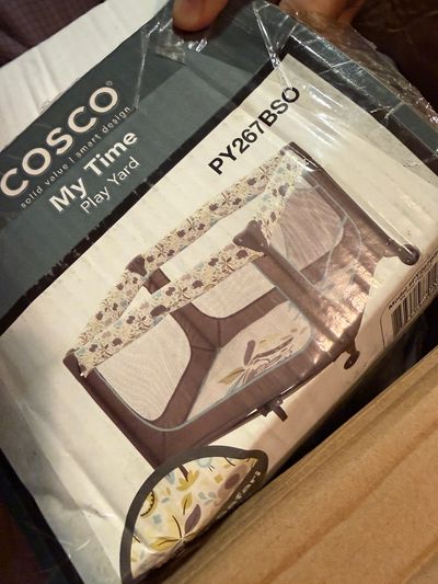 Cosco Pack n play with infant layer, mobile and diaper caddy