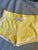 Justice active Yellow shorts, white trim 7-8