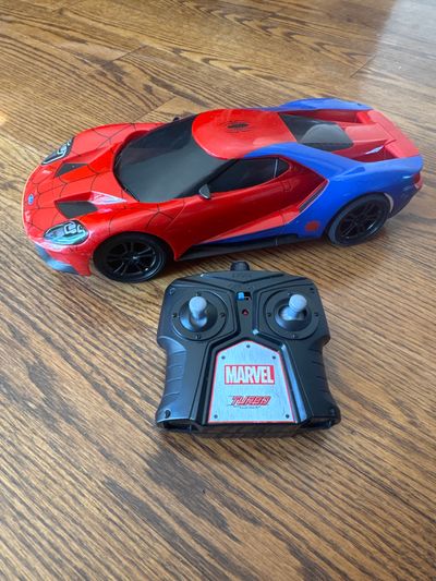 Spider man RC race car with remote. USB charger for car. Works great, fast