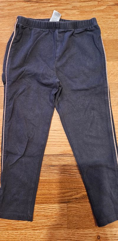 Oshkosh There is a narrow strip of rose gold trim on each side of legging 4T