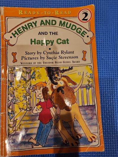 Henry and Mudge and the Happy Cat by Cynthia Ryla Henry and Mudge and the Happy Cat by Cynthia Rylant.