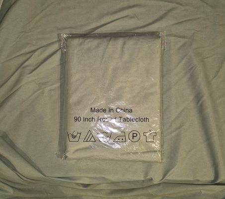 New 90in Round Tablecloth Sage Green never used, in package