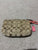Coach Wristlet with salmon color trim. Back zip. EUC