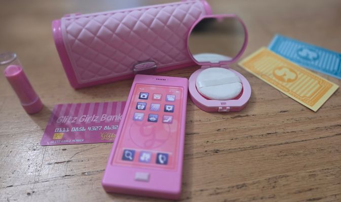 Girls glitz pretend make up and plastic clutch HAS A STICKER ON BACK OF IT, CAN TRY TO TAKE OFF