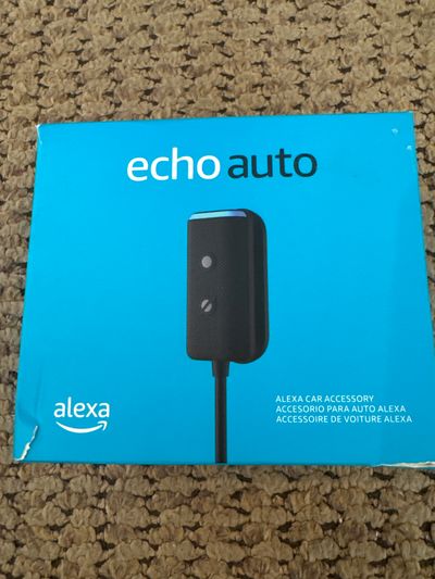 Brand new Alexa echo auto from Amazon Originally retail $55 use with iPhone or android Alexa on road