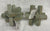 2 Brand New green wooden puzzle sculptures. 2 Brand New green wooden puzzle sculptures.