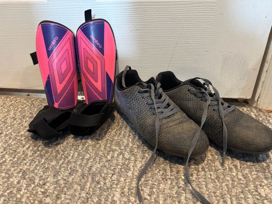 NA Soccer cleats and guards