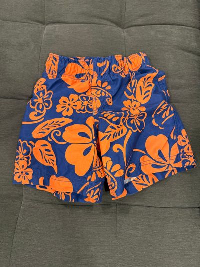 Childrens place Navy blue and orange flowers boys swim trunks 4T/4