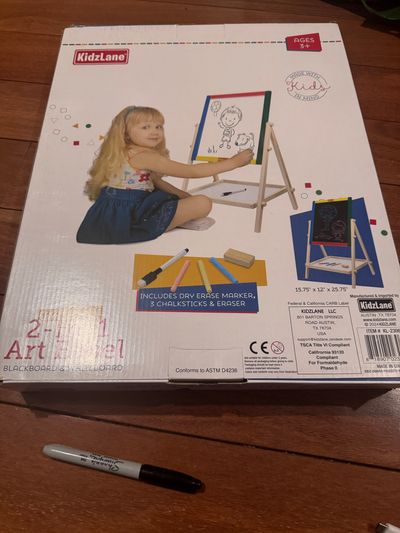 Brand new KidzLane two in one art easel retail $35 Blackboard & whiteboard supplies included
