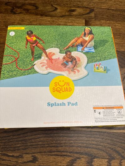 Brand new sun squad, splash pad from target 60 inches long by 59 inches wide