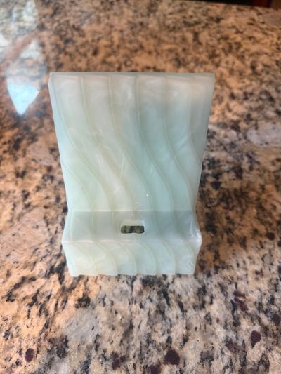 Phone stand With charger wire slot