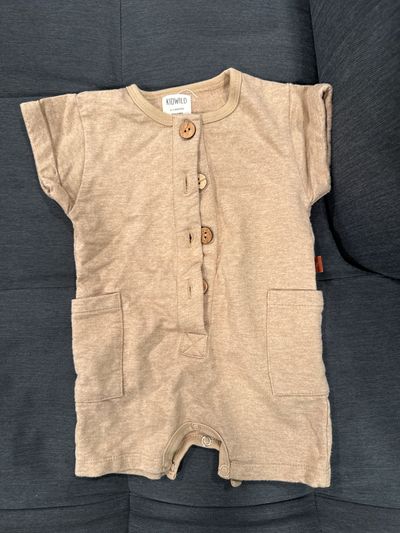 Kid wild Tan short sleeve onesie with buttons and 2 pockets 0-3 Months