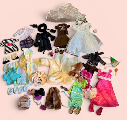 Lot of doll clothes and accessories