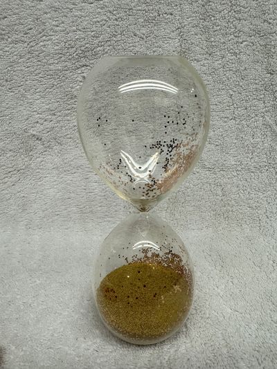 Very Cool Hourglass with gold sparkles. Very Cool Hourglass with gold sparkles.