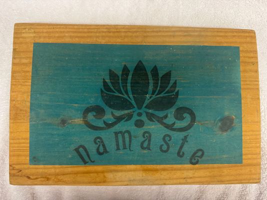 Namaste on a wooden block. 14inx9in. Namaste on a wooden block. 14inx9in Can be cutting board or decor