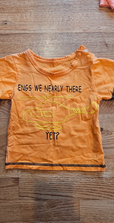 NA Like new graphic Tshirt quick drying fabric 18 Months