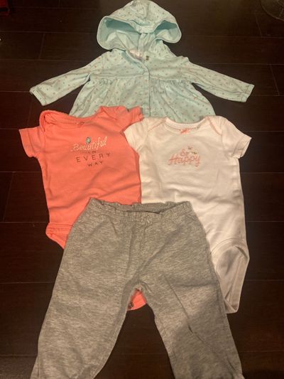 Carters 3 months. 2 onesies, 1 sweater and 1 pants 3 Months