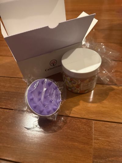 Brand new calm grace scalp scrub set with brush Plastic taken off for picture purpose retail $36 expires 11/27