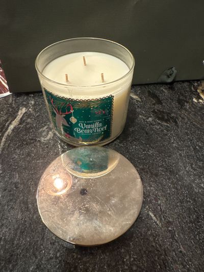 Brand new Bath & body Works, vanilla bean Noel Scented candle, silver top has some wear, but never used