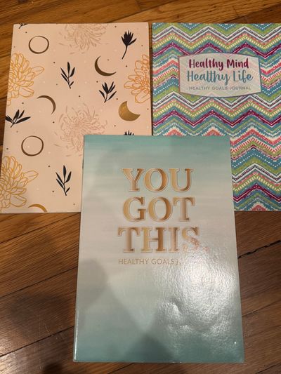 2 Healthy goals journals and 1 moon notepad 2 Healthy goals journals and 1 moon notepad