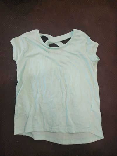 Freach toast short sleeve top features a distinct cross-back design 7-8
