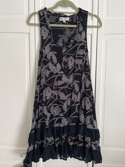 Papillon EUC black swing dress. Ruffles at bottom. Women's - S