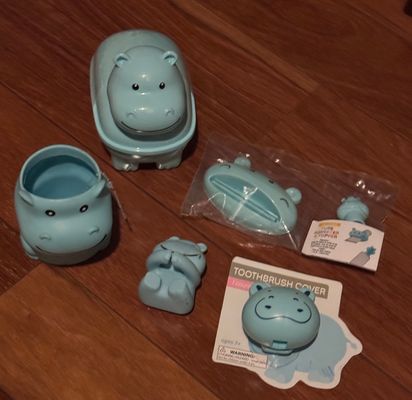Brand new six count bathroom accessories Toothbrush holders, cups, soap, dish, and squeezer