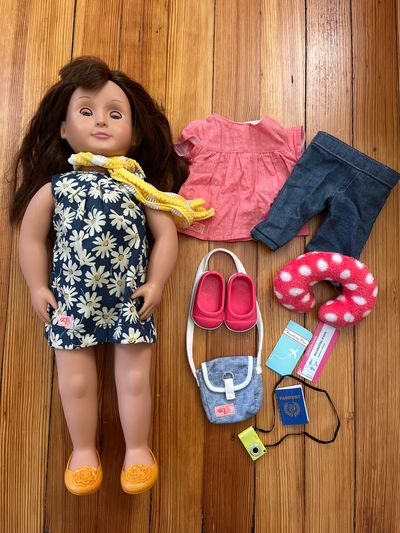 Our Generation Reese doll. Travel Set outfit, accessories. Like New