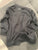 Under armor Black zip up under armor jacket with pocket on each side 7-8