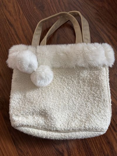 White hand bag