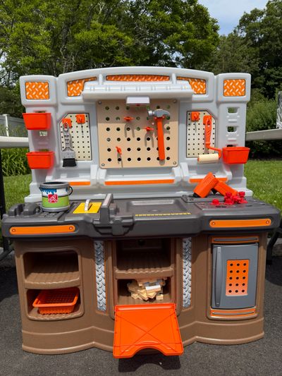 Home Depot workbench with tools and Buildable birdhouse that changes color with water