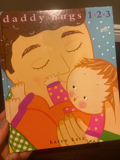Daddy hugs 123 Hard cover book by Karen katz