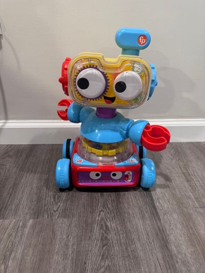 Fisher price 4 in 1 learning bot learning bot, moves around. rolling base, light up numbers
