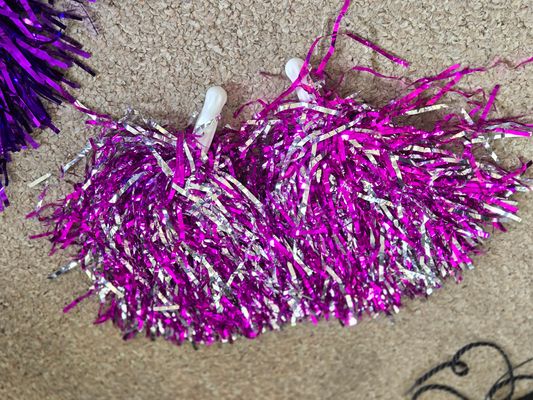 silver and purple pom poms