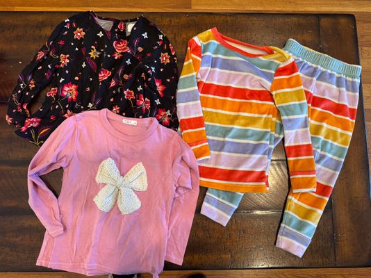 Girls 3T Clothing Lot. Pjs have small ink spots Cozii and Old Navy Shirts and cat and jack pjs. Small ink stains 3T