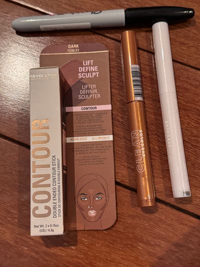 Brand new dark Revolution contour stick and two Cover girls eyeshadow sticks